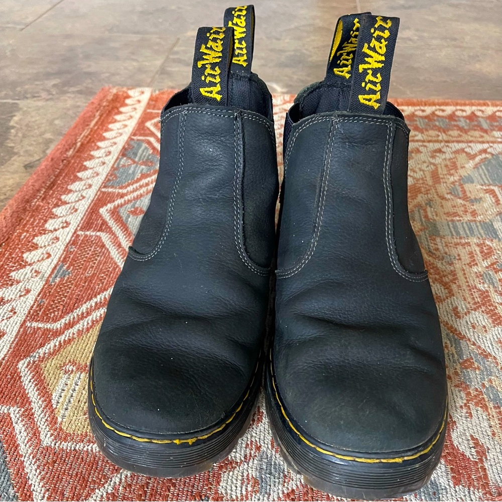 Dr. Martens black leather chelsea boot.